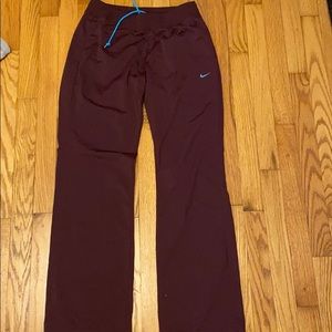 Maroon Nike sweatpants